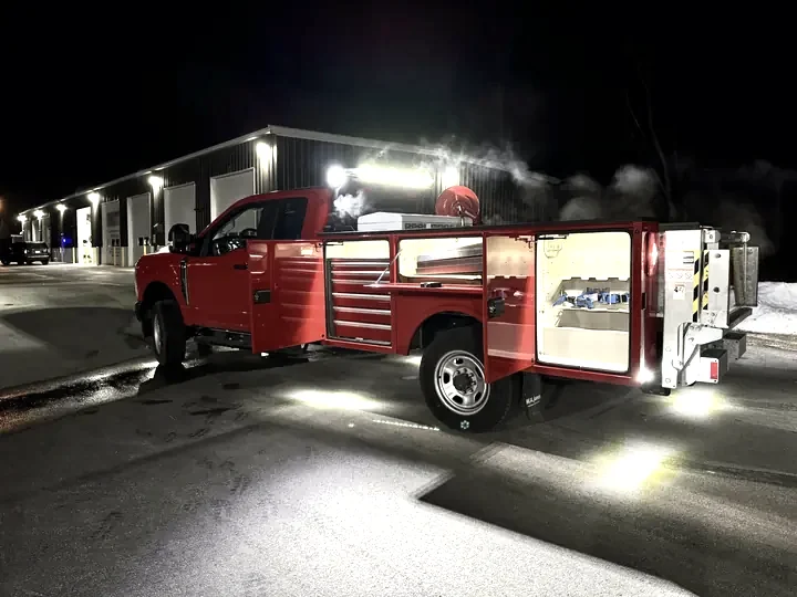 Emergency service truck with compartment and scene lighting built out by Auto Obsessions